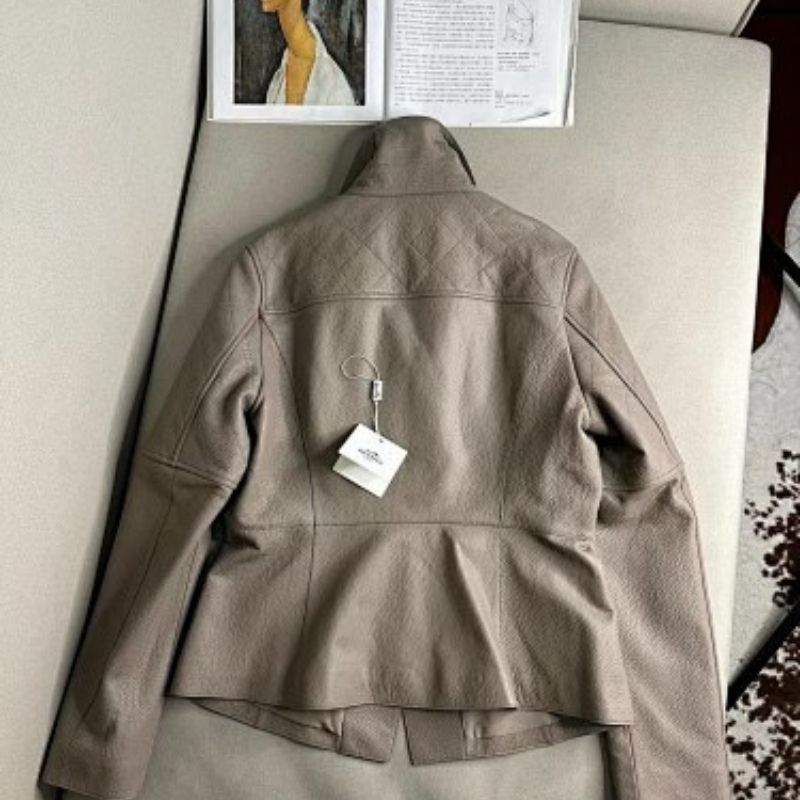 Hermes taupe asymmetrical zip jacket with wide, notched lapels, a cropped fit