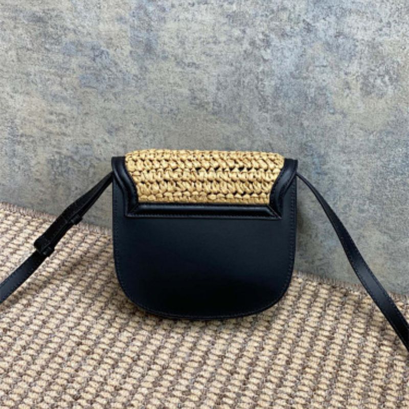 Saint Laurent Kaia Satchel in raffia and leather.