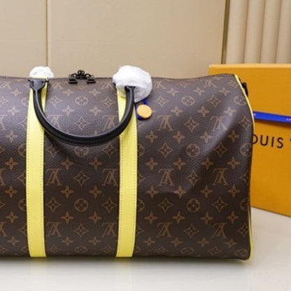 Louis Vuitton Keepall Bandoulière 50 in Monogram Macassar.