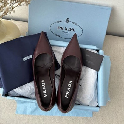 Prada 85mm Pointed-Toe Leather Pumps in a rich burgundy