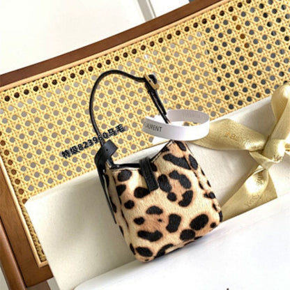 Saint Laurent Le 37 Mini bucket bag in leopard-print calf hair.