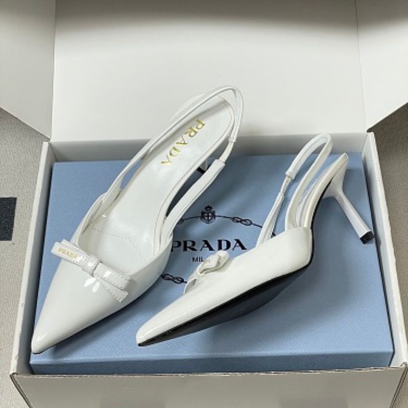 Prada Vernice Patent Leather Bow Slingback Pumps.