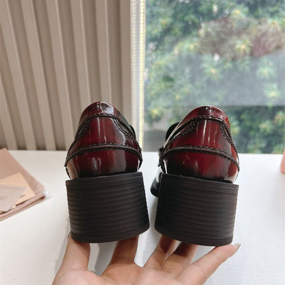 Miu Miu Brushed Leather Penny Loafers with a lug sole.