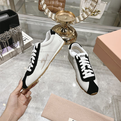 Miu Miu Plume Suede and Nappa Leather Sneakers.
