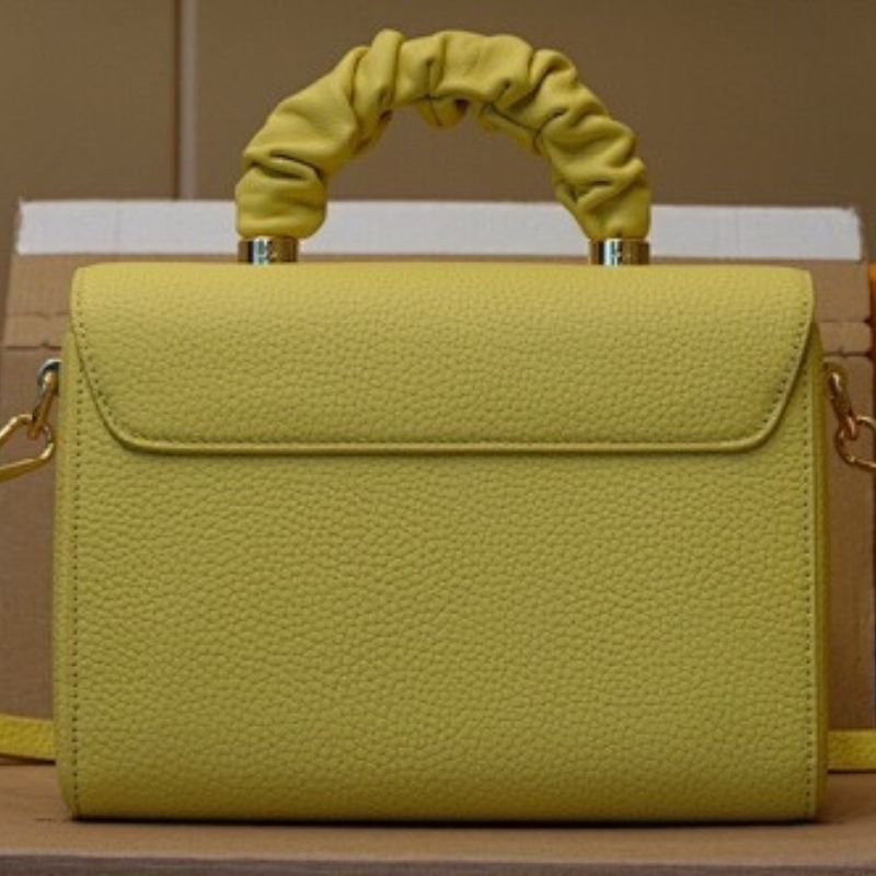 Louis Vuitton Twist PM from the Scrunchie line
