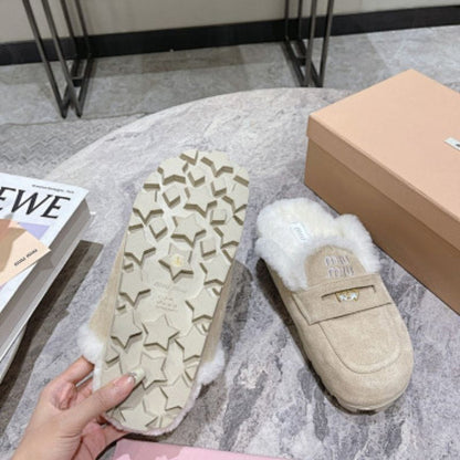 Miu Miu Suede Mules with Shearling lining.