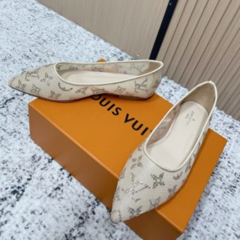 Louis Vuitton Gala Flat Ballerinas in a beige or nude color.