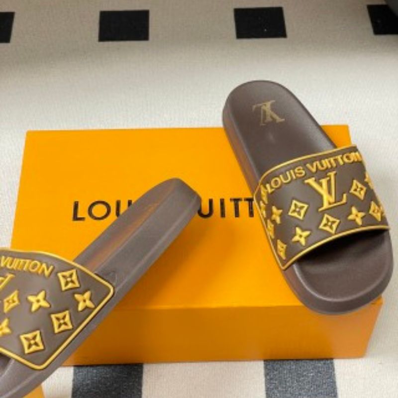 Louis Vuitton Monogram Flats or slides.