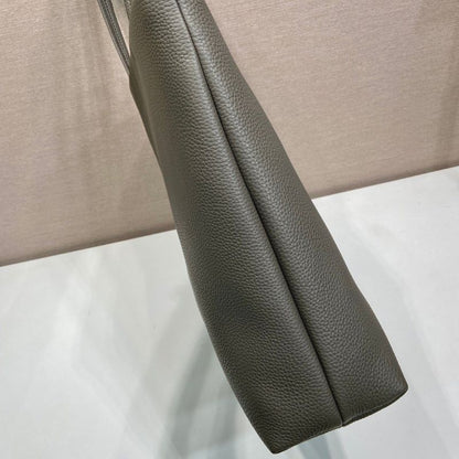 Prada Large Pebbled Leather Tote Bag in clay grey.