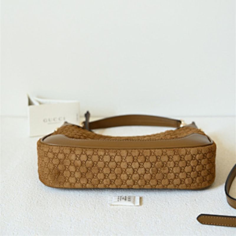 Gucci B medium shoulder bag micro GG-debossed suede with smooth calf leather trim.