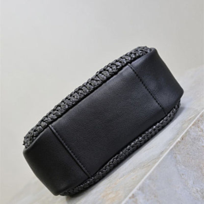 Saint Laurent Le 5 à 7 Soft Hobo bag in black crocheted raffia.