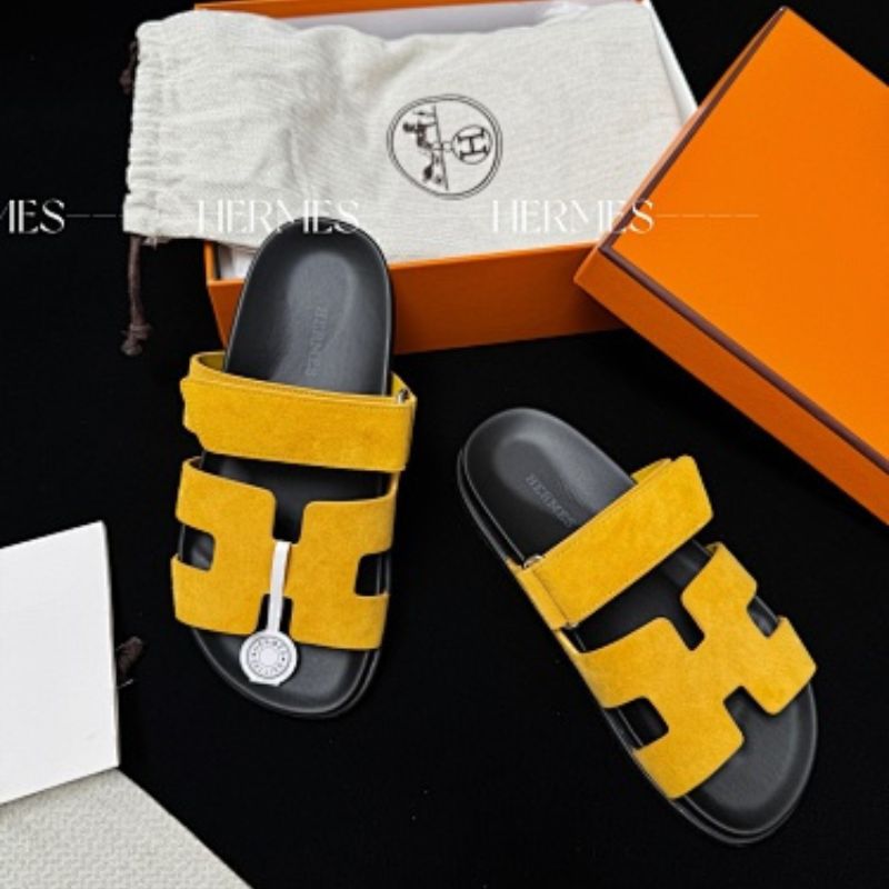Hermès Chypre Sandals in a vibrant yellow shade,