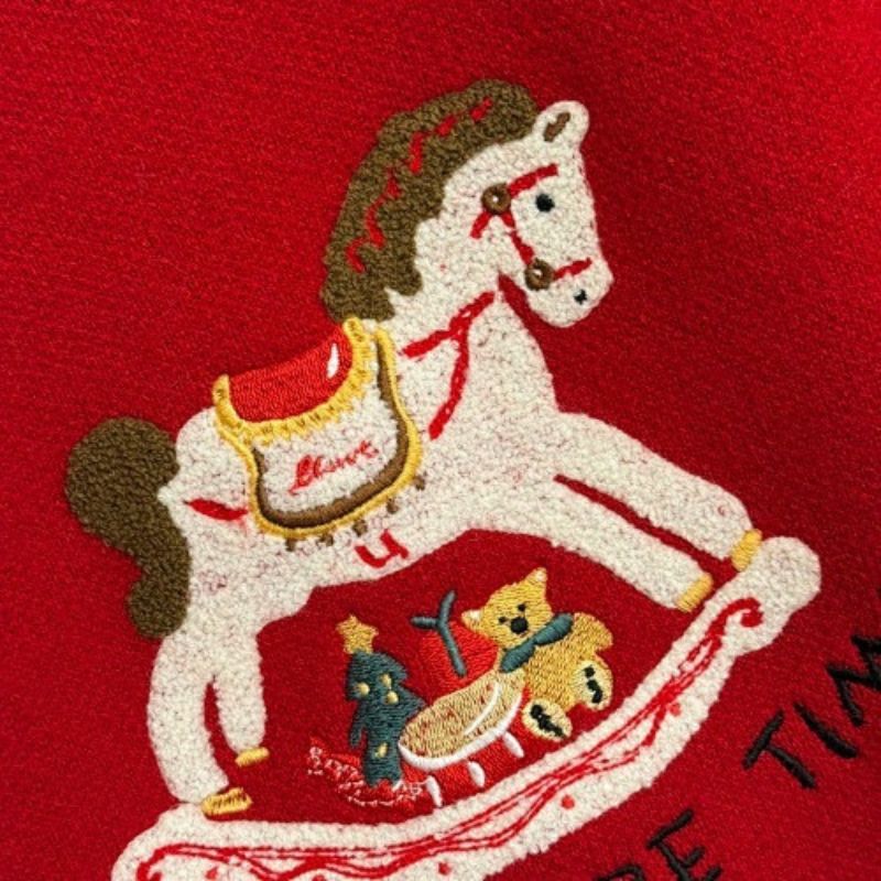 Hermès  red knit sweater featuring a white horse graphic