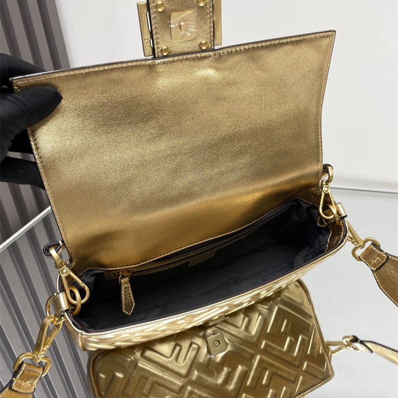 Fendi Baguette NM (New Model) Bag in metallic gold leather.