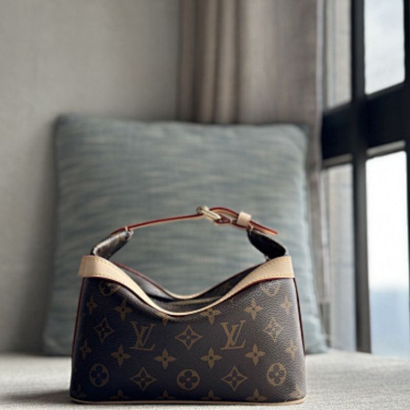 Louis Vuitton Cruiser Toiletry Bag in Monogram coated canvas.
