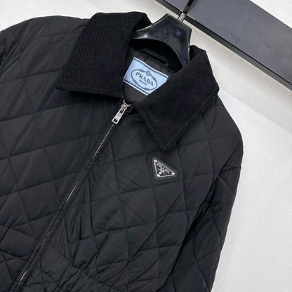Prada quilted jacket with a black velvet or corduroy collar.