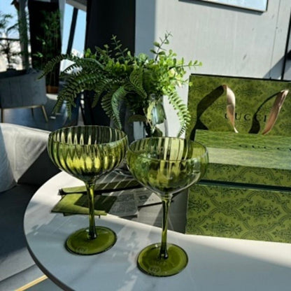 Gucci green-tinted glassware,