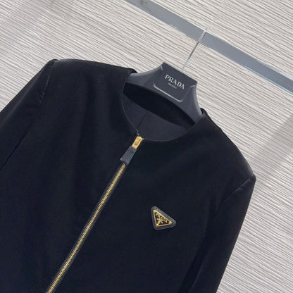 Prada velvet jacket and mini skirt set.