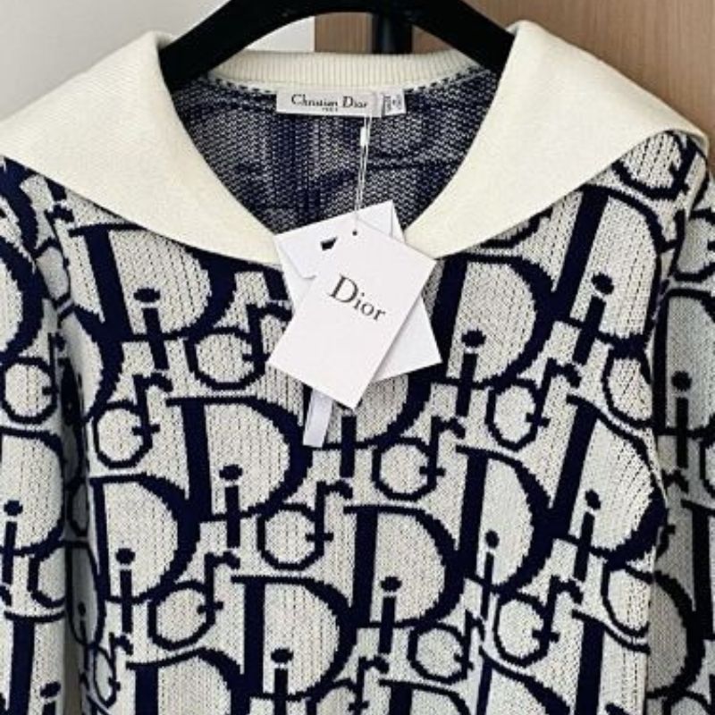 white and navy blue Christian Dior knit top with a white collar