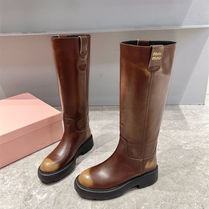 Miu Miu Knee-High Boots with a chunky sole
