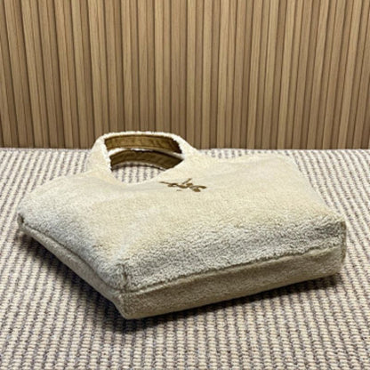 Saint Laurent Icare Maxi Tote in Shearling.