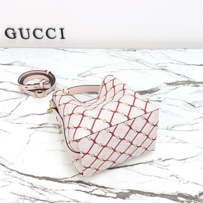 Gucci GG Emblem small bucket bag.