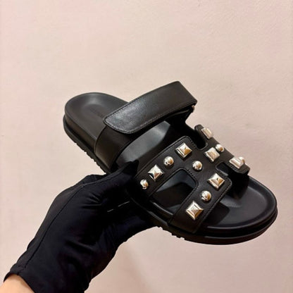 Hermès Chypre Sandals featuring a studded design