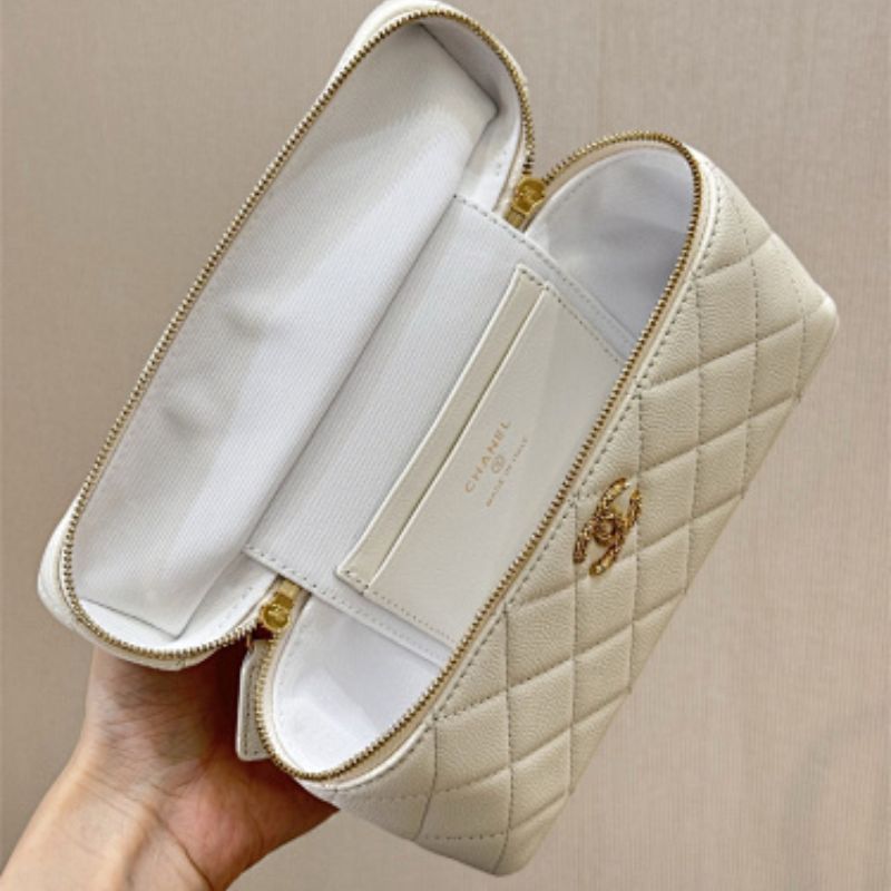 Chanel 26C Vanity Case in White Caviar leather.