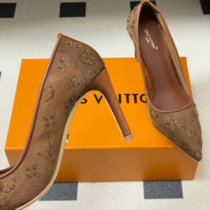 Louis Vuitton Gala Pumps in a sophisticated brown/tan colorway.