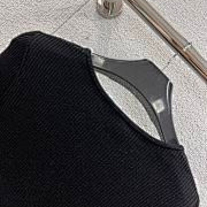 Celine cropped long-sleeved cardigan with metallic buttons.