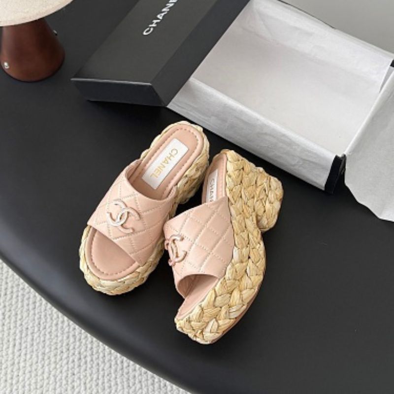 Chanel Quilted Interlocking CC Straw Platform Mules in light pink.