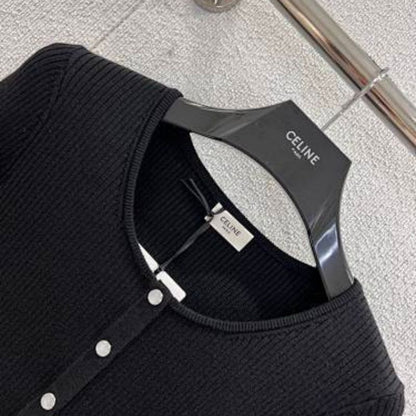 Celine cropped long-sleeved cardigan with metallic buttons.
