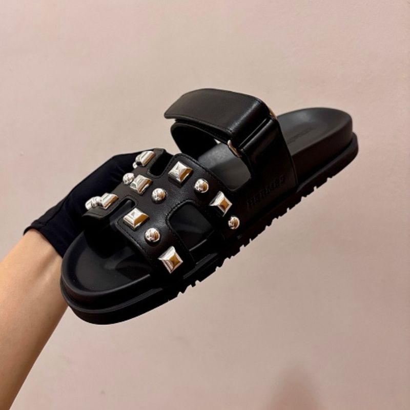 Hermès Chypre Sandals featuring a studded design