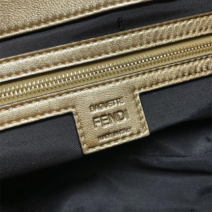 Fendi Baguette NM (New Model) Bag in metallic gold leather.
