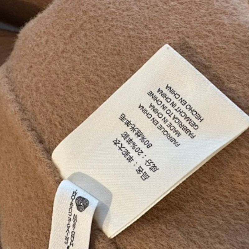 Christian Dior camel wrap coat with a black belt