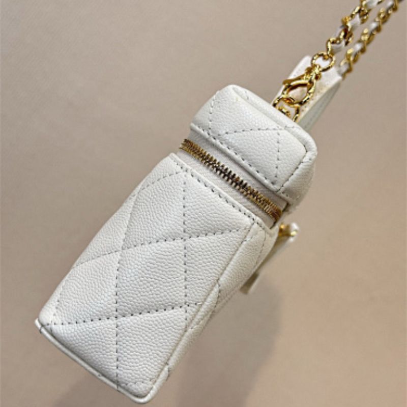 Chanel 26C Vanity Case in White Caviar leather.