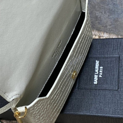 Saint Laurent Cassandre Phone Holder in Shiny Crocodile-Embossed Leather.