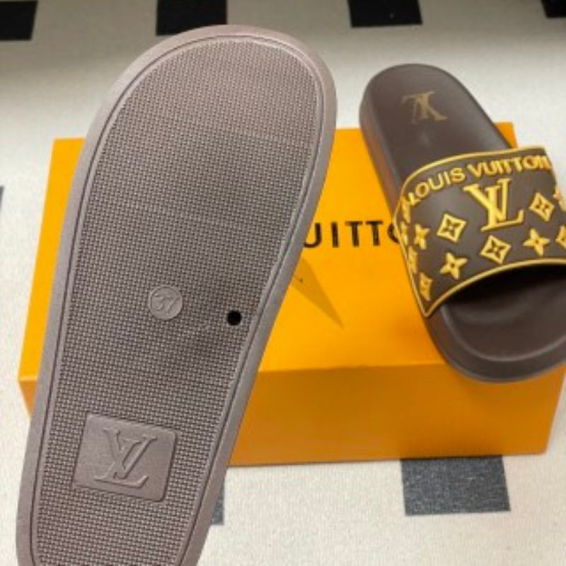 Louis Vuitton Monogram Flats or slides.