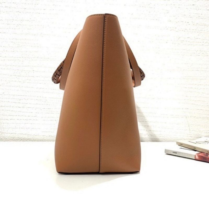 Loewe Anagram Leather Tote with Wicker Handles.