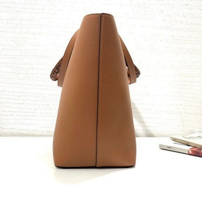 Loewe Anagram Leather Tote with Wicker Handles.