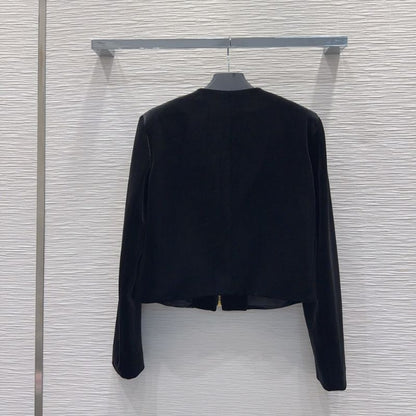 Prada velvet jacket and mini skirt set.