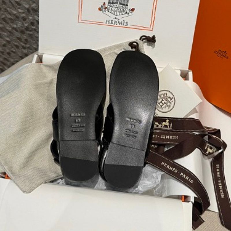 Hermès Ines Sandals in black calfskin