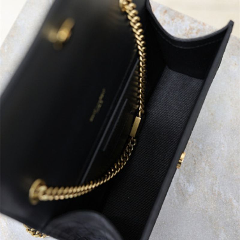Saint Laurent Kate Shoulder Bag in black croc-embossed leather.