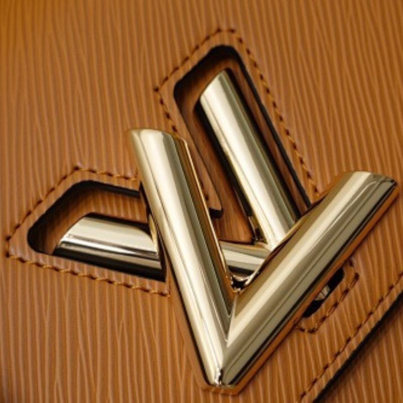 Louis Vuitton Twist MM in Gold Miel