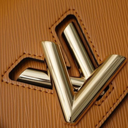 Louis Vuitton Twist MM in Gold Miel