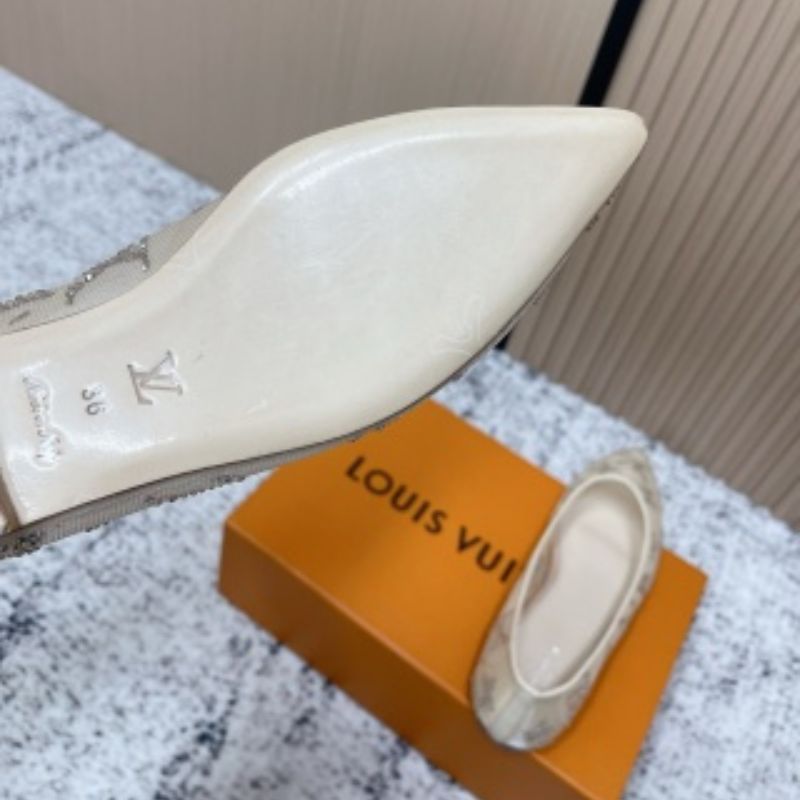 Louis Vuitton Gala Flat Ballerinas in a beige or nude color.