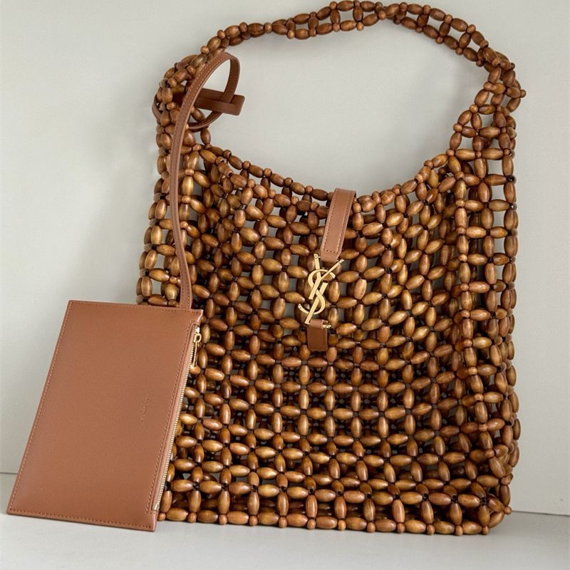 Saint Laurent Le 5 à 7 supple large bag made from wood beads.