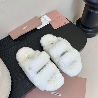 Miu Miu Natural Shearling Slides.