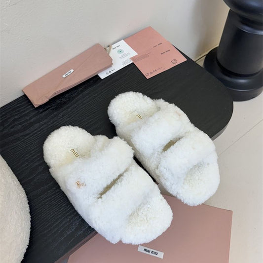 Miu Miu Natural Shearling Slides.