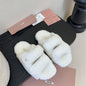 Miu Miu Natural Shearling Slides.